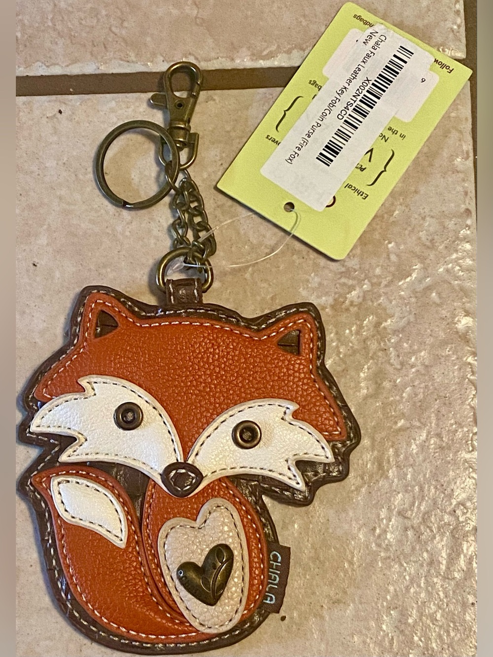 Chala Faux Leather Key Fob and Coin Purse in the "Fire Fox" design.